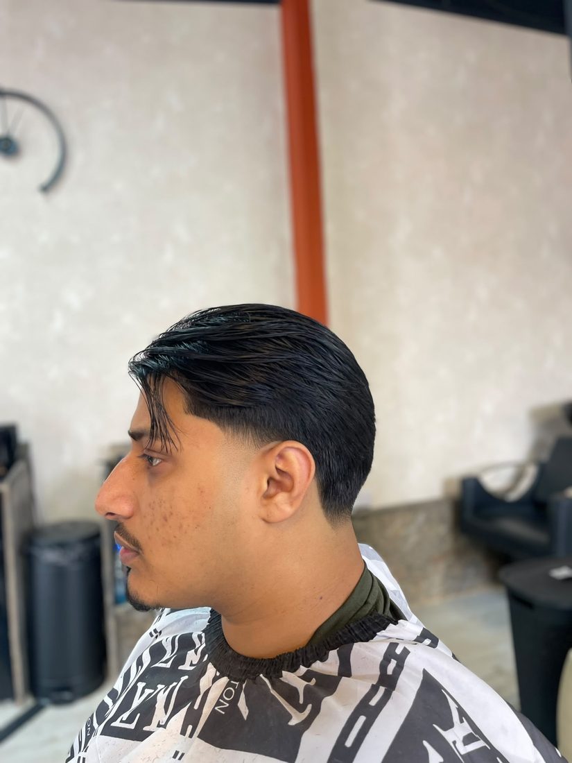 Combed side part fade