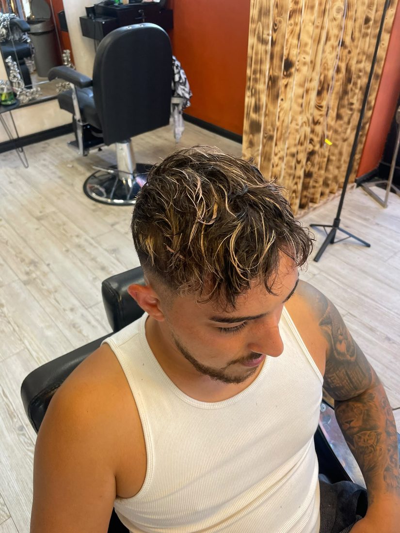 Curly fade with highlights