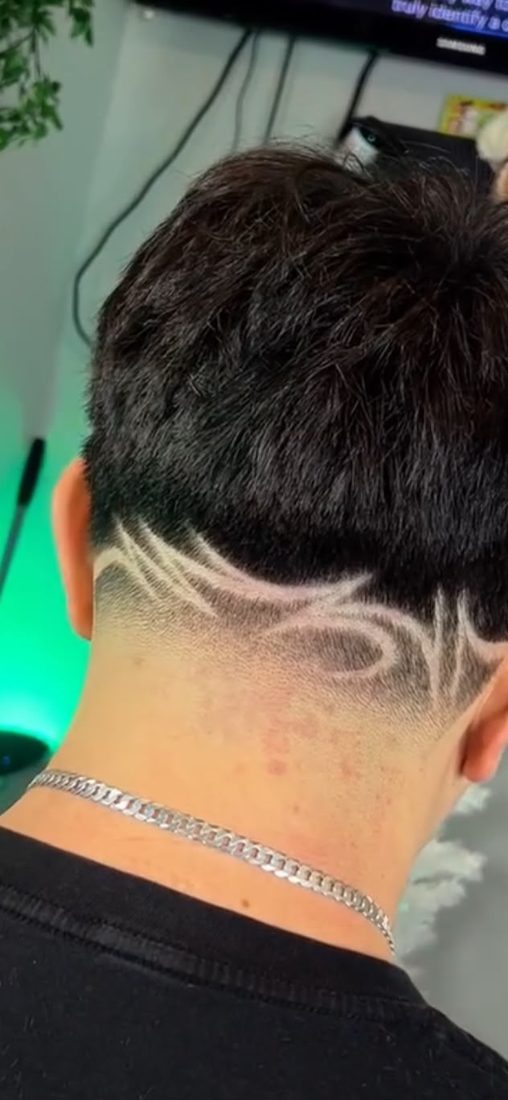 Custom hair design shaved into the nape