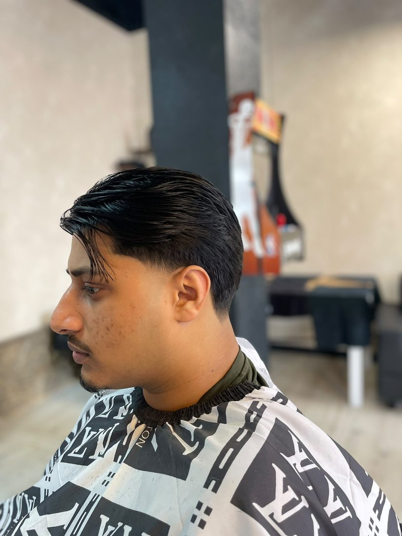Dark side-swept fringe fade