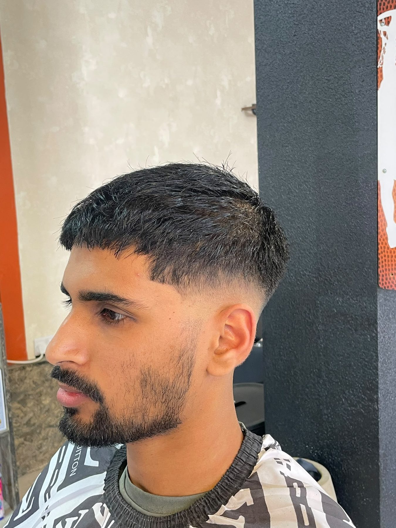 Skin fade with full beard, finished look at Axiom